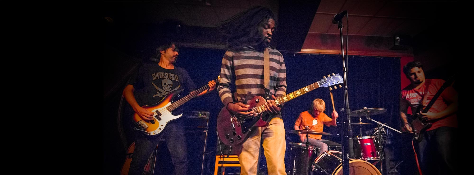 Rock band playing a live show