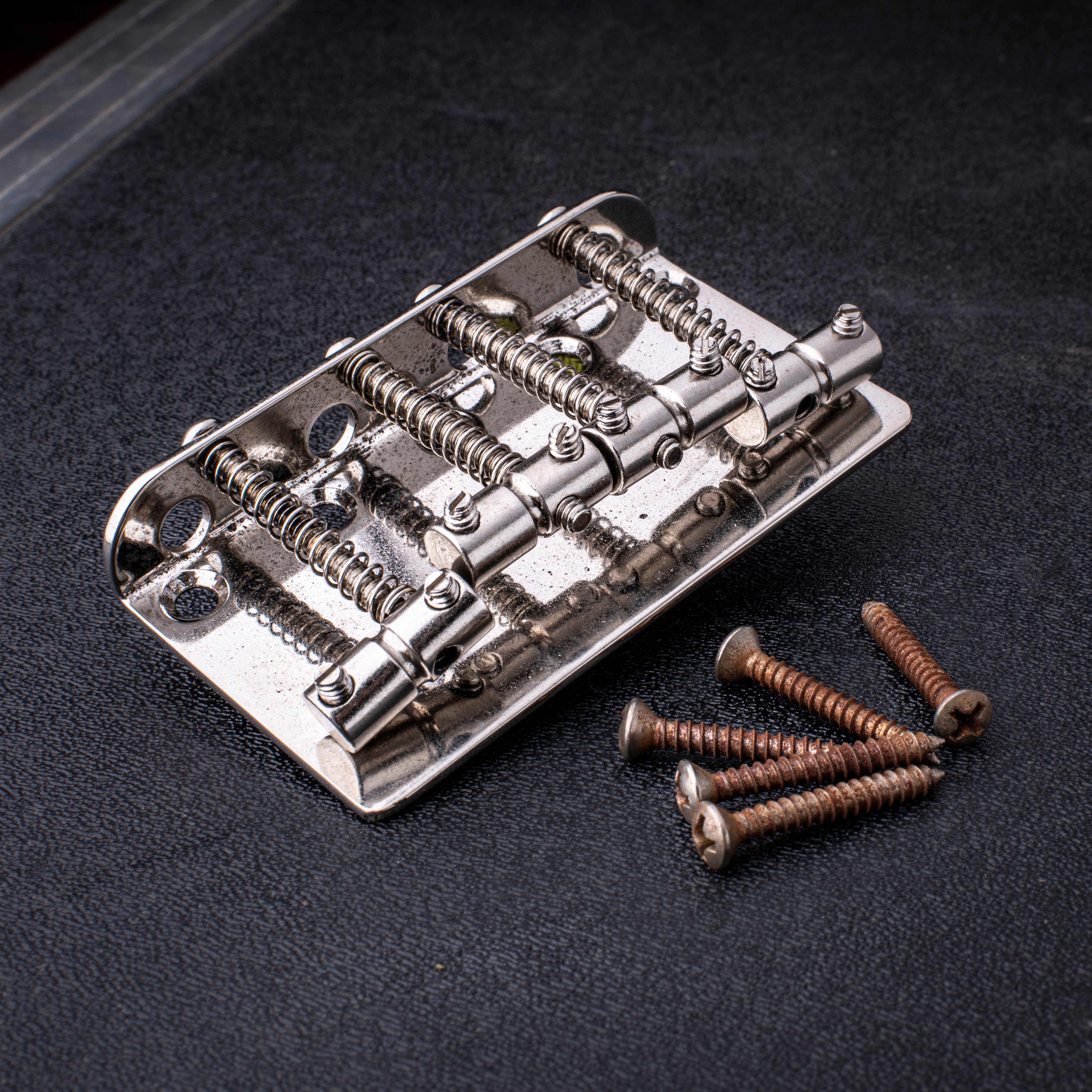 GuitarSlinger Cryocated Aged 4-String Bass Bridge with Grooved Barrel Saddles