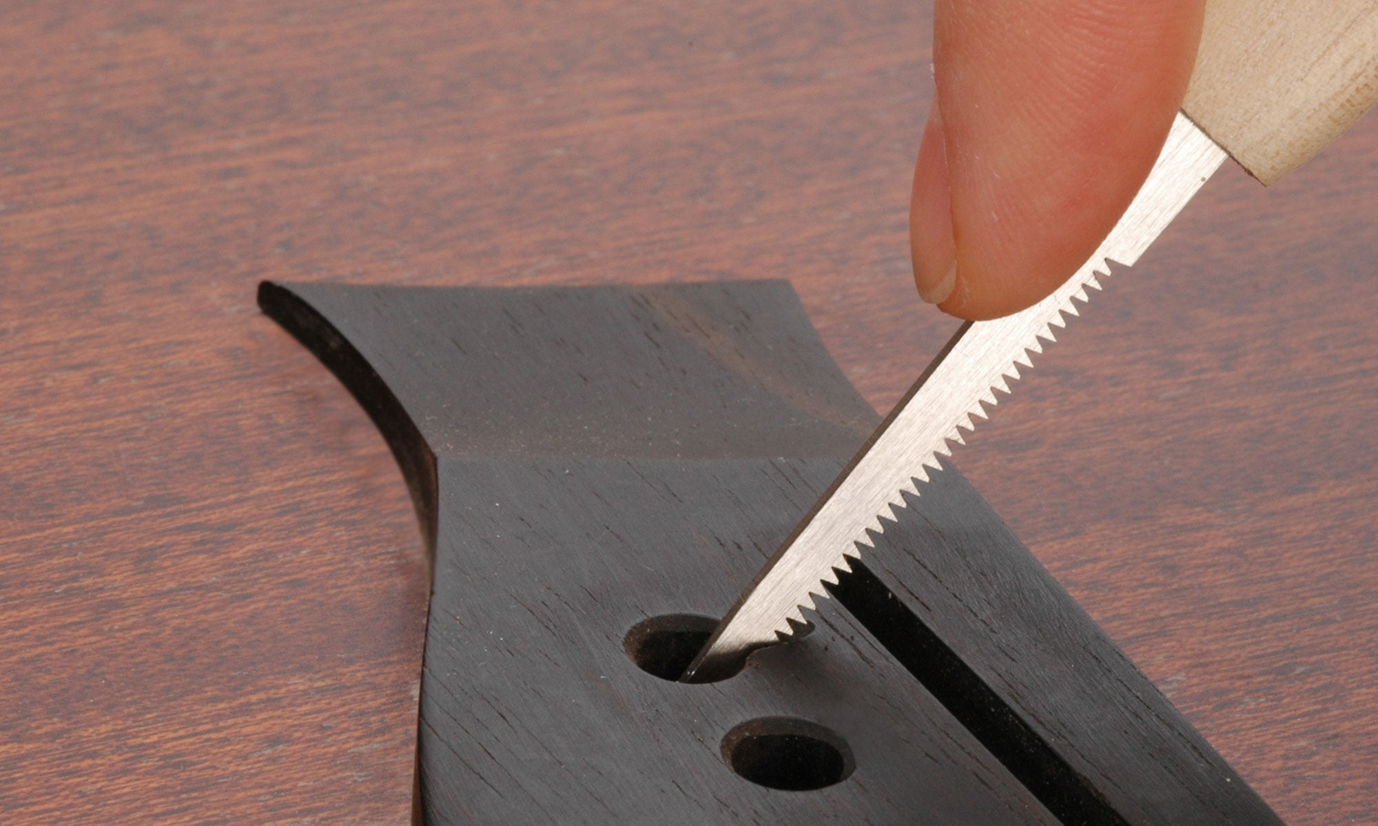 Bridge Pin Hole Slotting