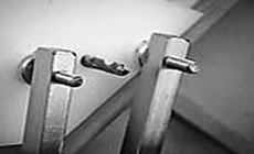 Bridge pin holes