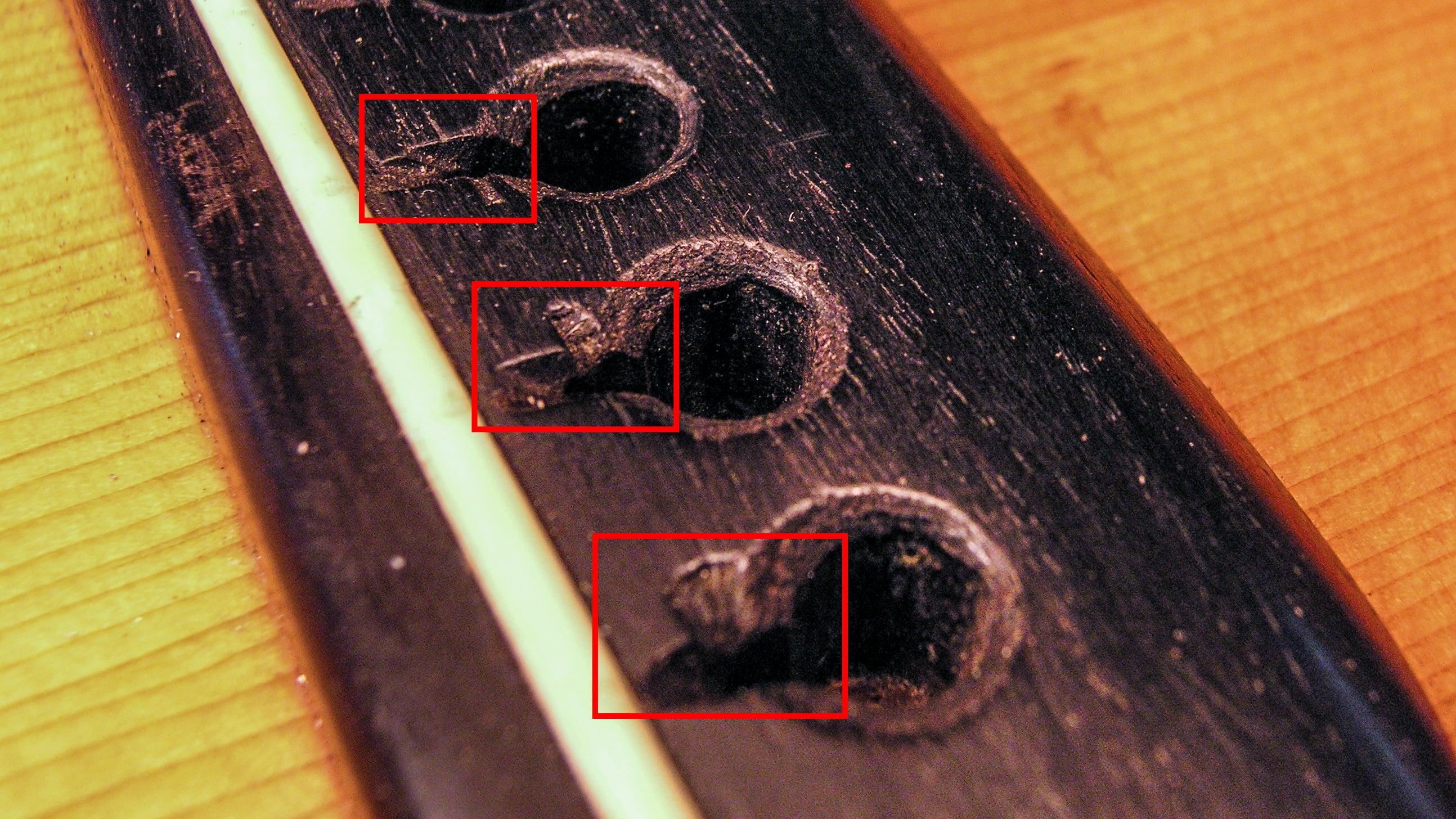 Fixing a 1937 Martin bridge. The first step is fixing a sandwich!