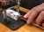 Use a fret dressing stick to remove the burr.