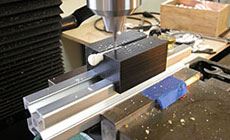 Bridge pin slotter
