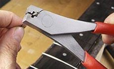 Fret crimper