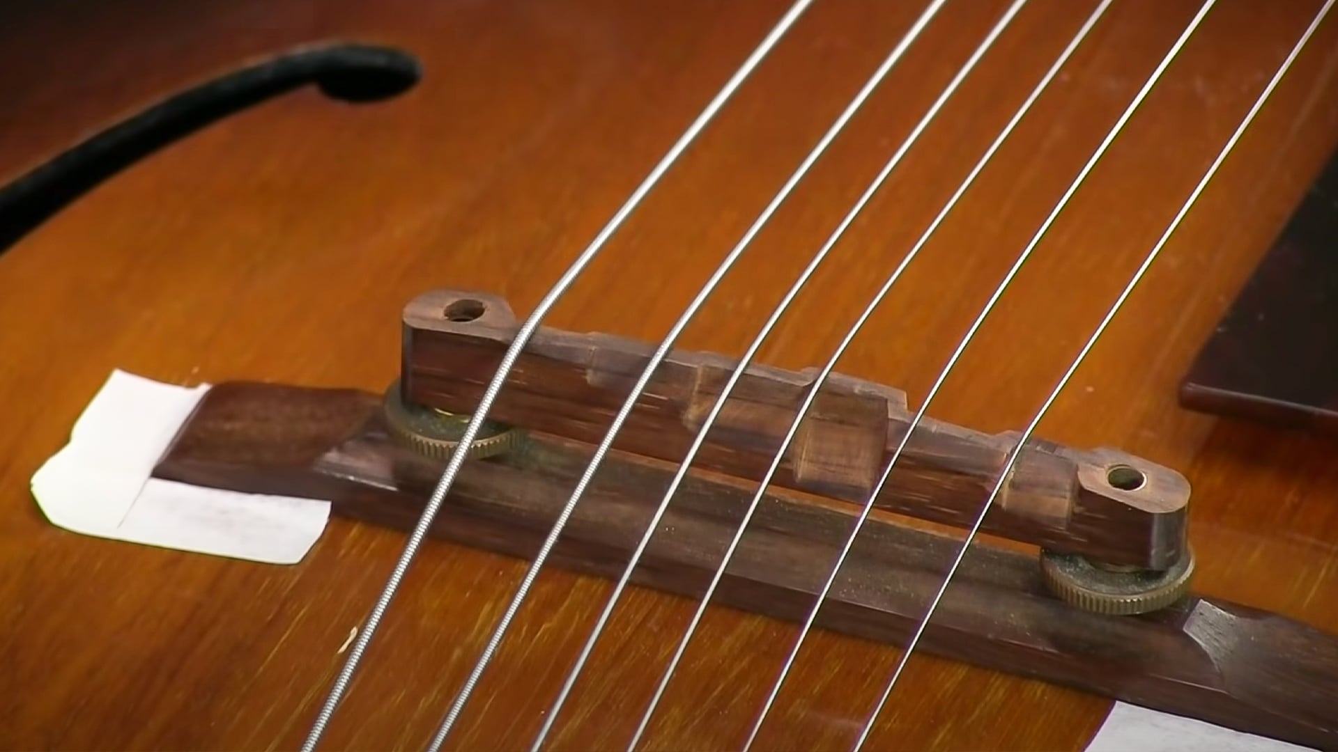 Setting the string spacing at the bridge